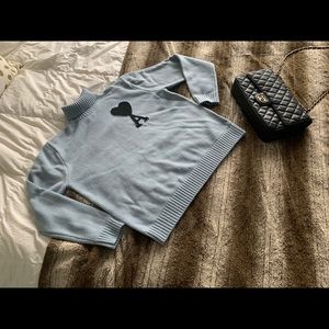 Ami by Alexandre Mattiussi light blue sweater.